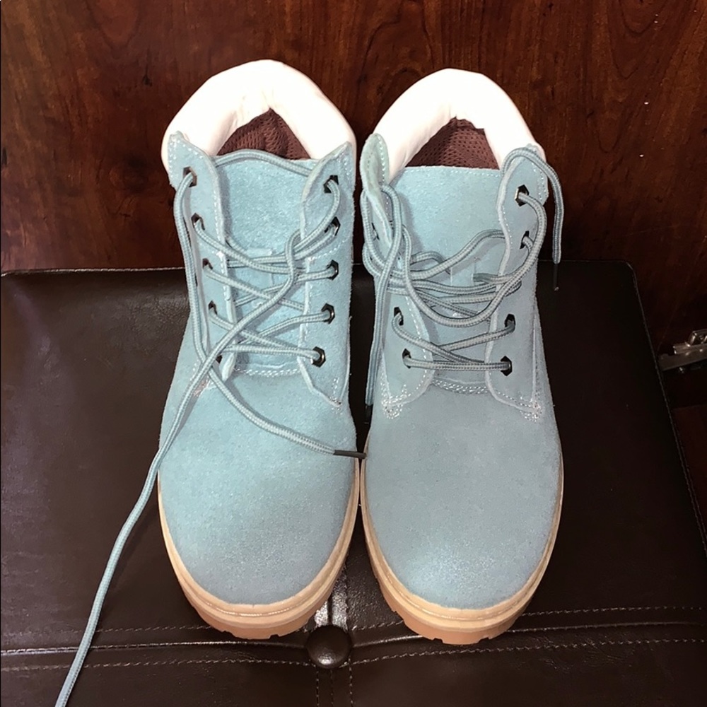 Blue boots with white trim.